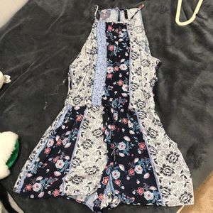 Blue floral patterned romper with front tie